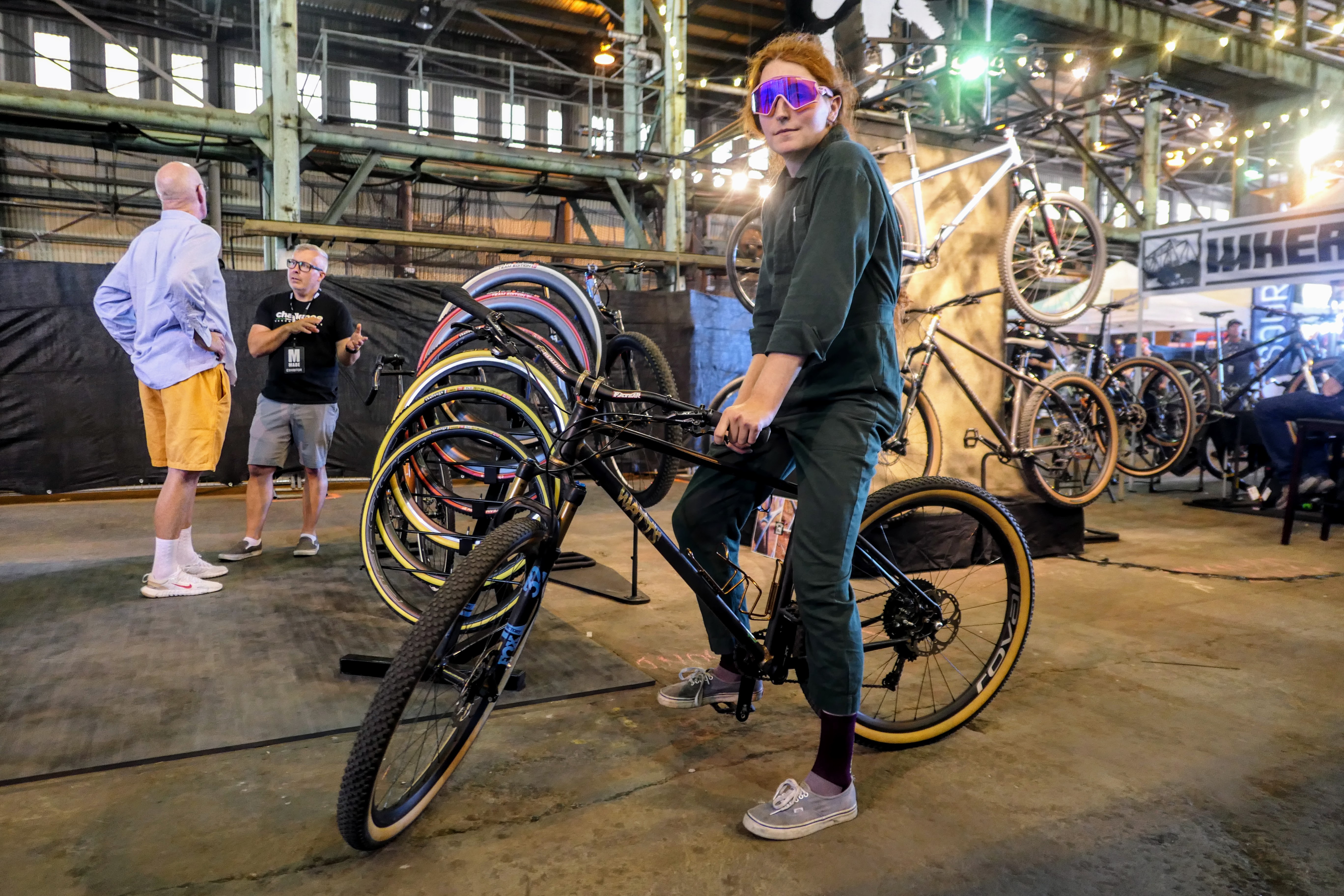 Watts poses with a custom mountain bike they created